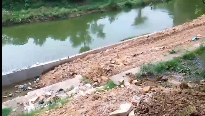Questions raised over the construction of Vishwanath Ghat, a 15-foot-high wall blocks access to the river.